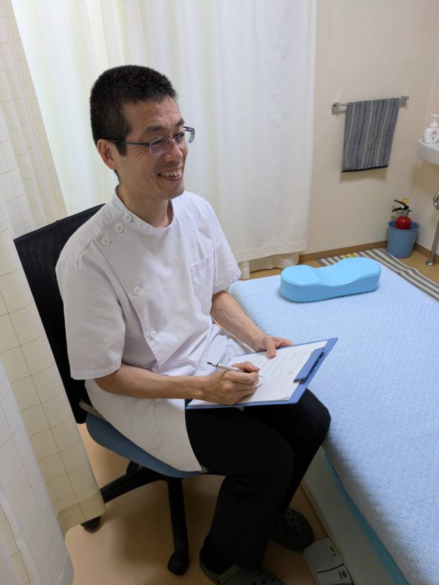 施術後の説明の写真